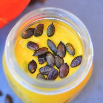 Jar with yellow pumpkin smoothie