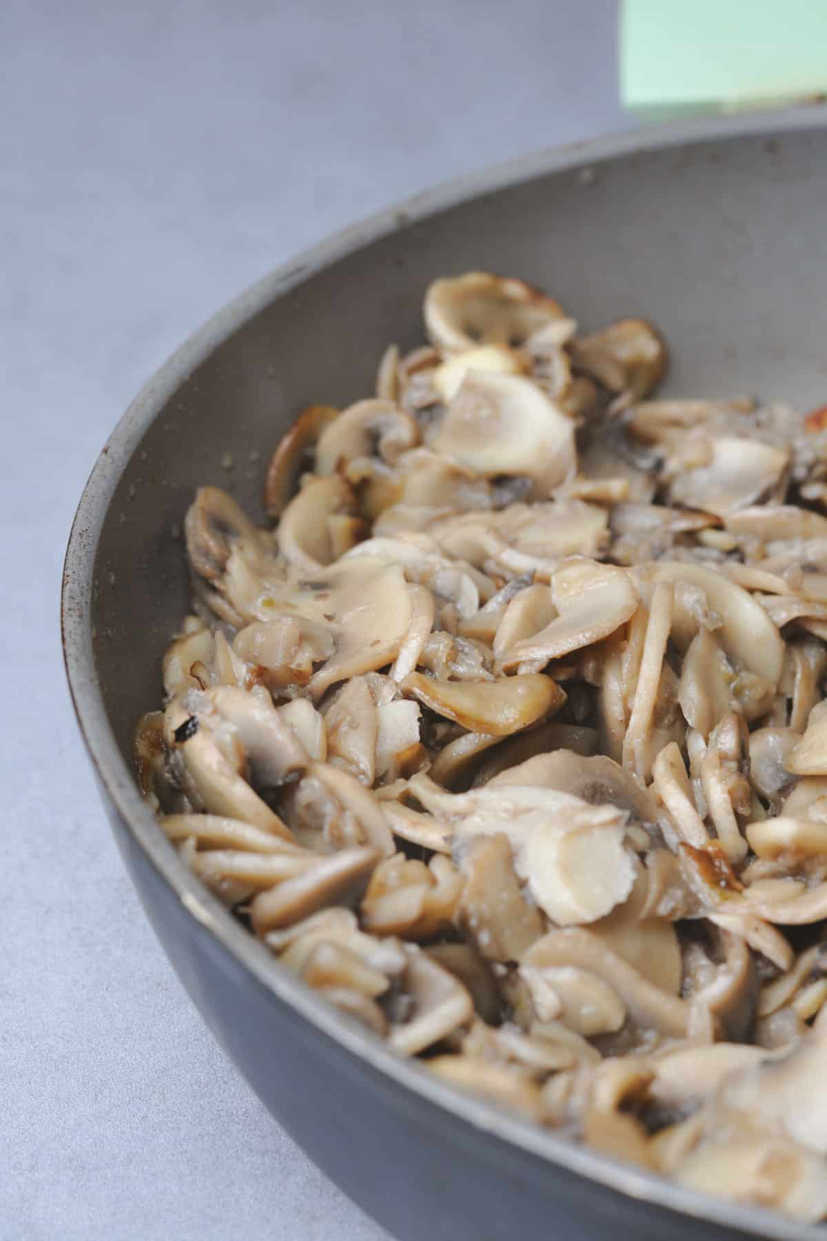 Cooked mushrooms in a pan