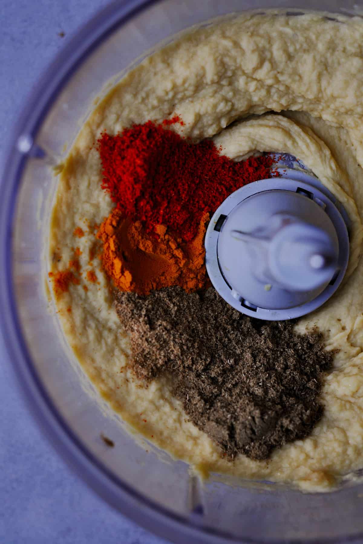 hummus in the food processor with spices
