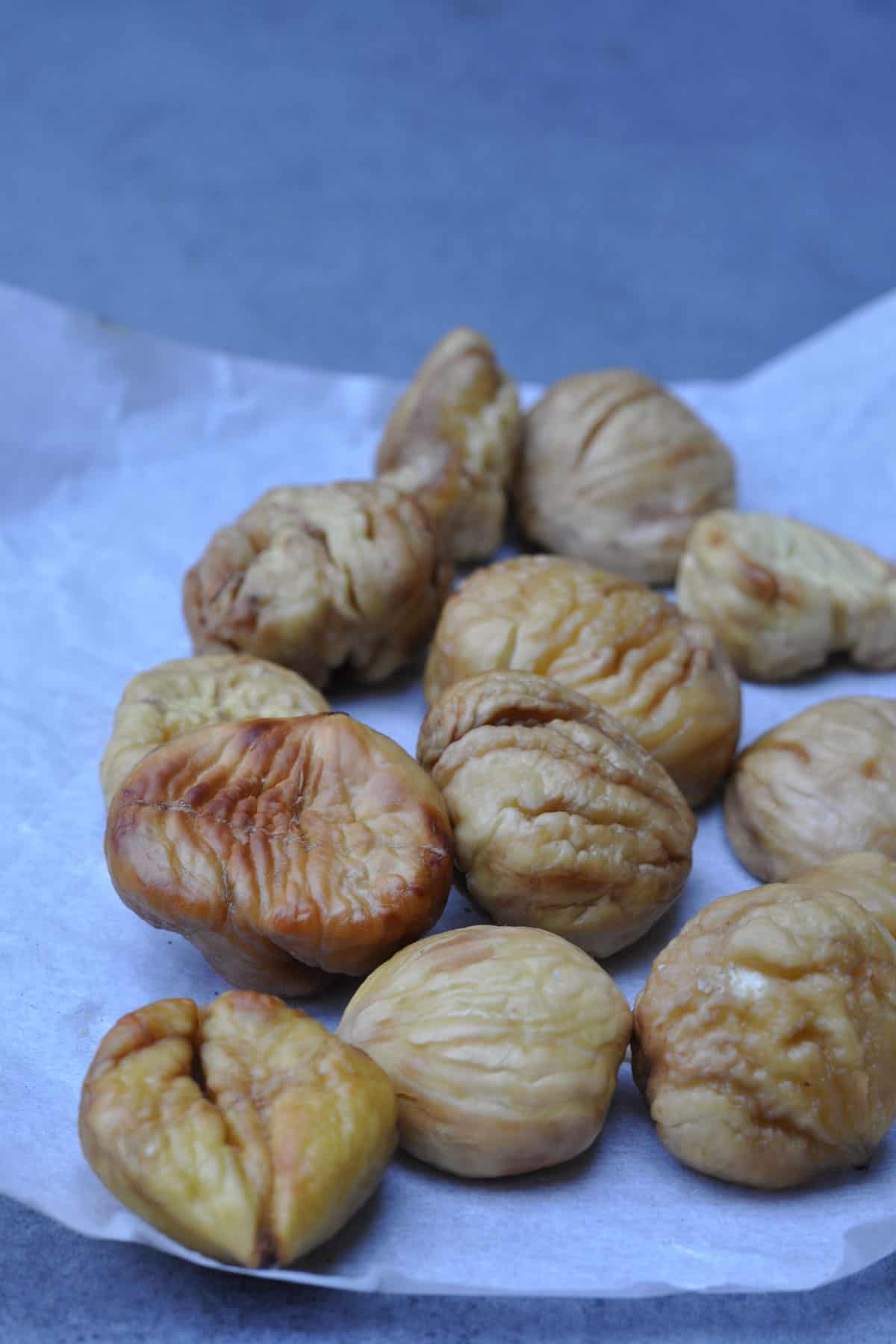 peeled roasted chestnuts on a table