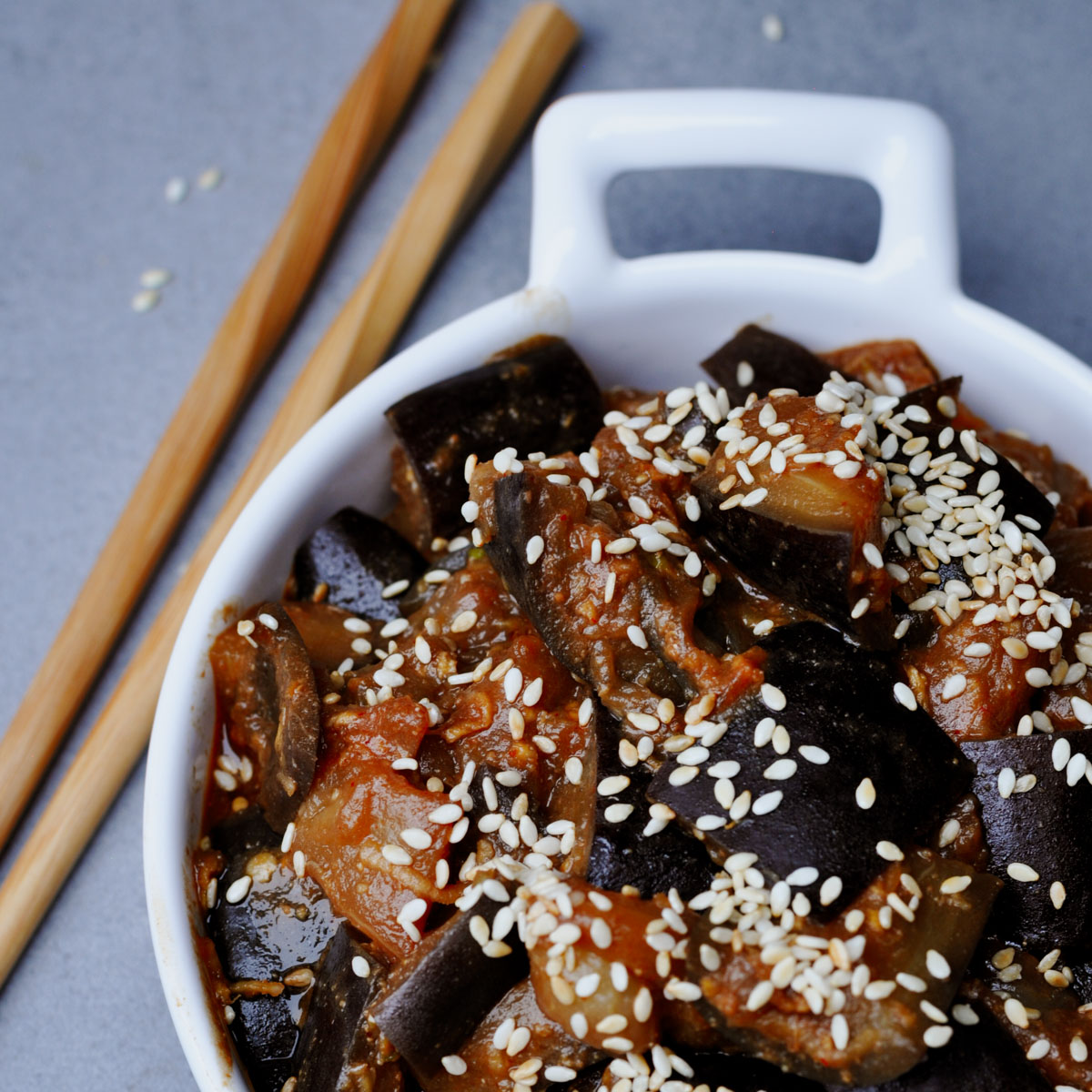 Steamed aubergines with miso sauce on a serving plate