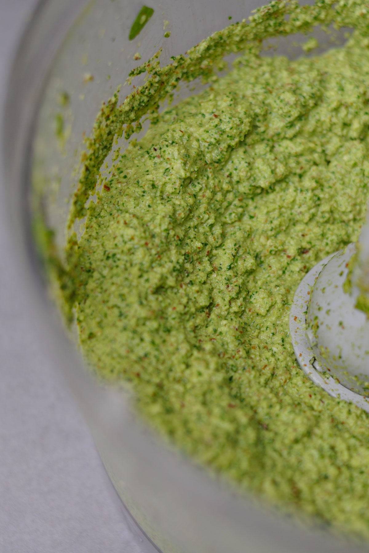 arugula and hazelnuts pesto in a food processor