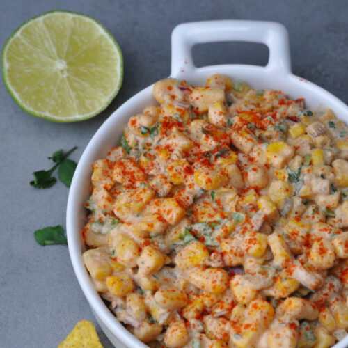 Vegan Mexican street corn elote salad on a serving plate.