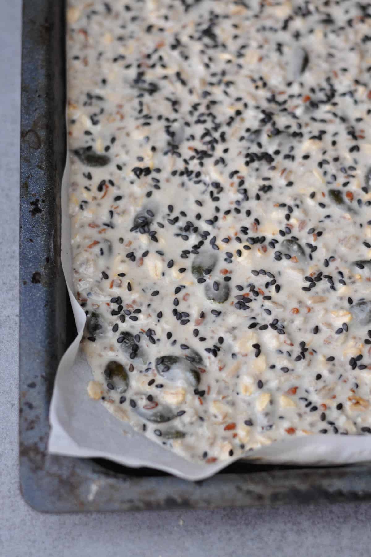 Mix Ingredients for Multi-Seed Crispbread on a baking tray