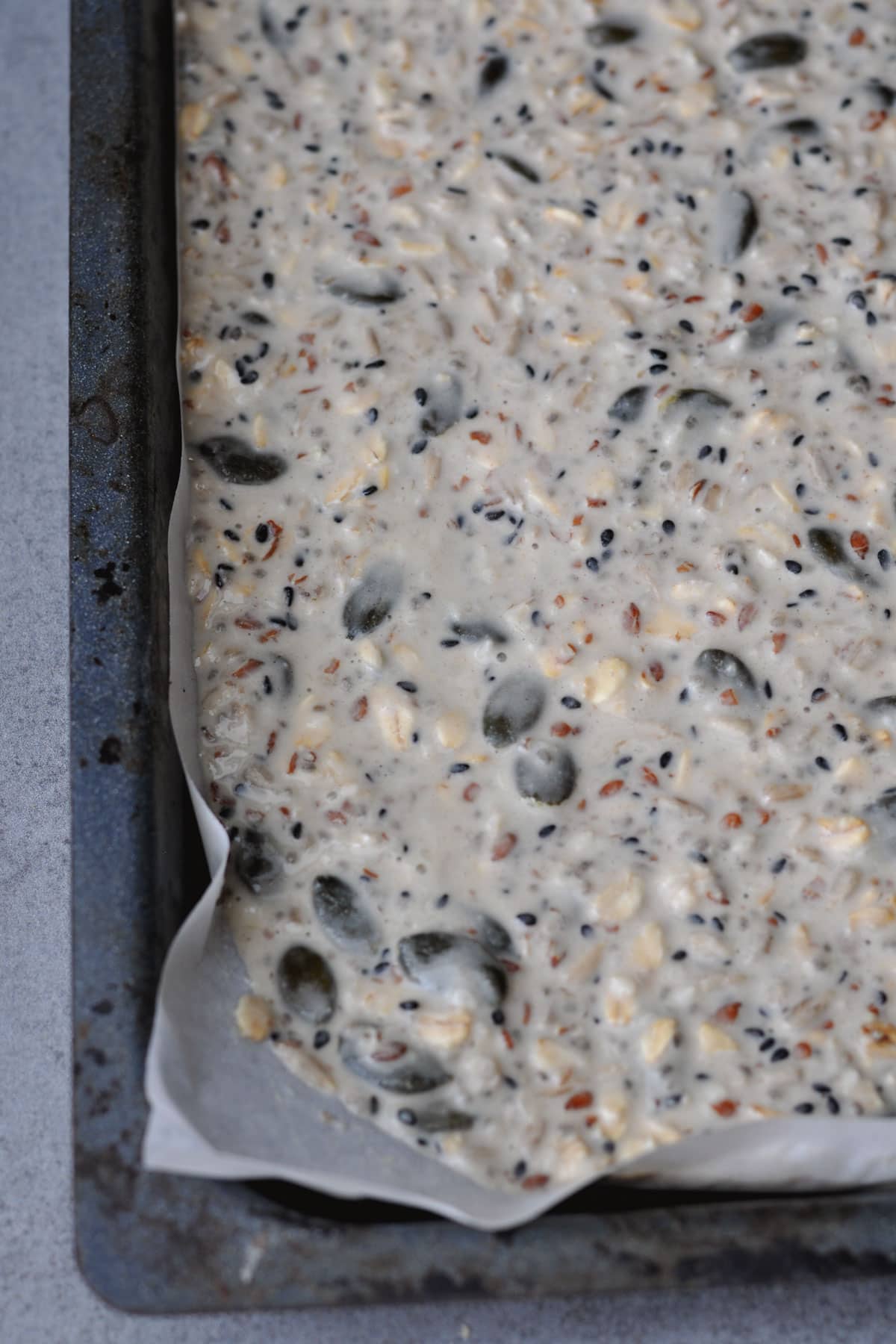 Mix Ingredients for Multi-Seed Crispbread on a baking tray