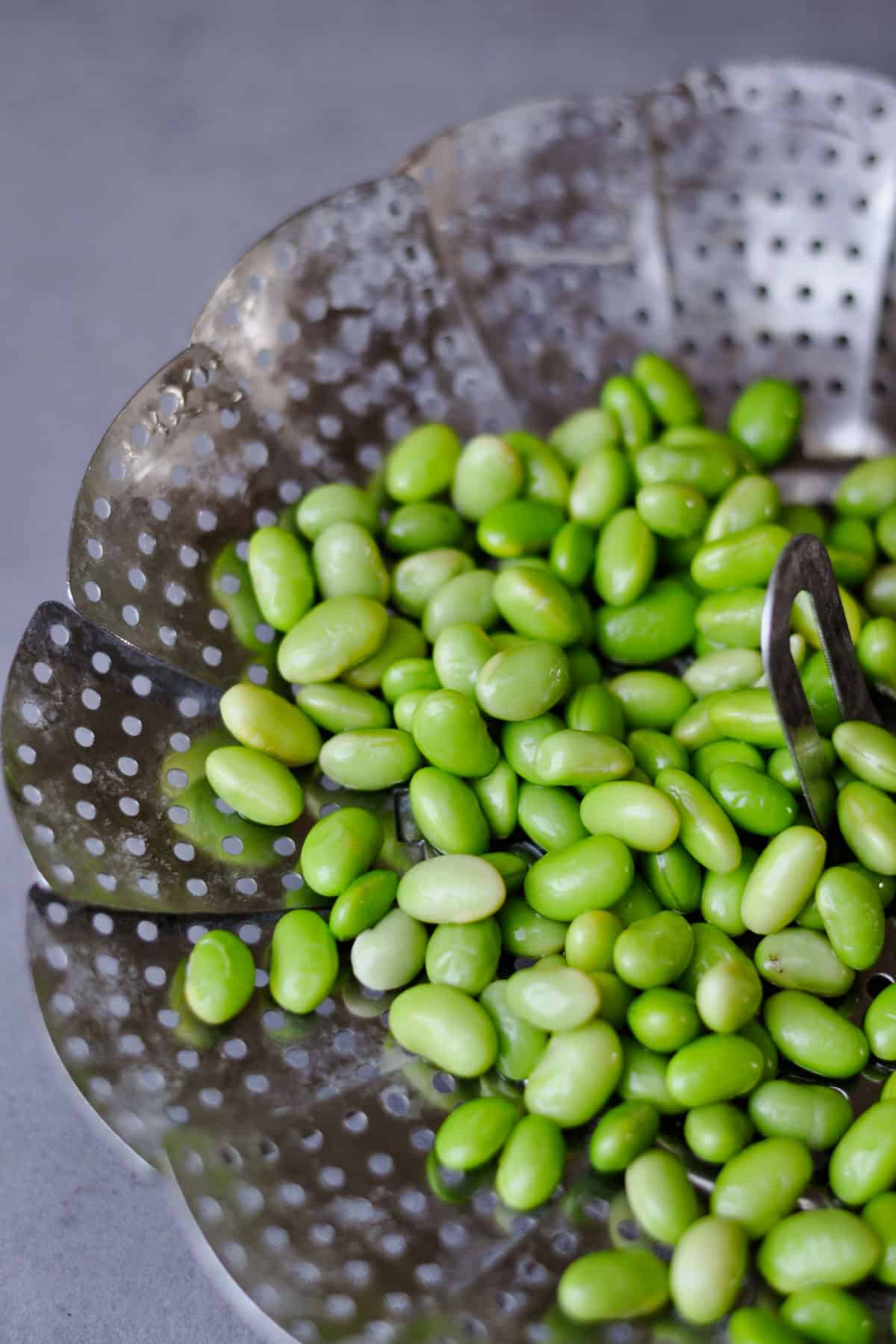 frozen edamame beans cooked in hot water