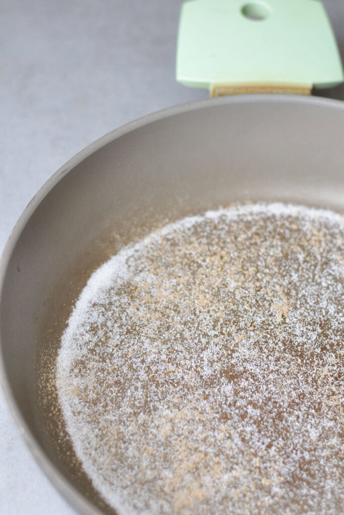 salt and pepper in a hot pan