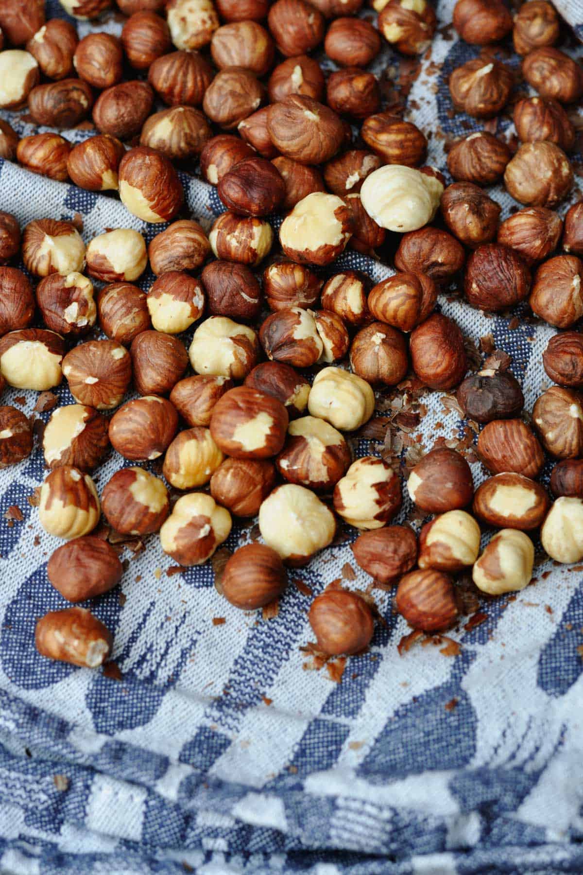 roasted hazelnuts on a kitchen towel