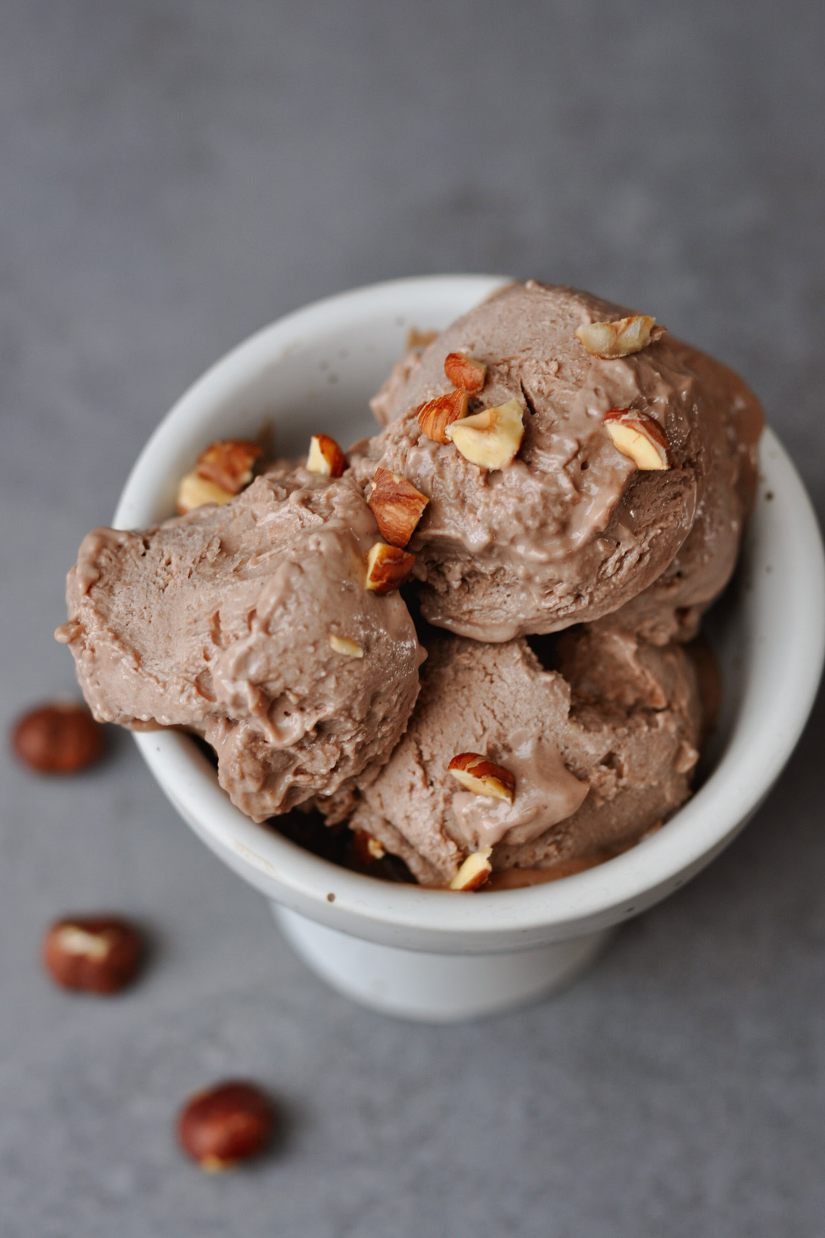 vegan nocciola and chocolate gelato in white cup